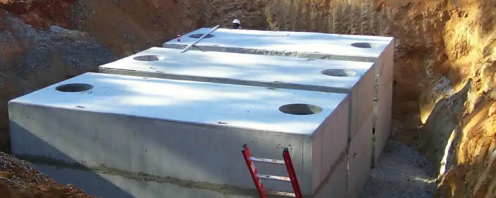 Septic tank installation site with a newly placed concrete tank in Dayton, OH